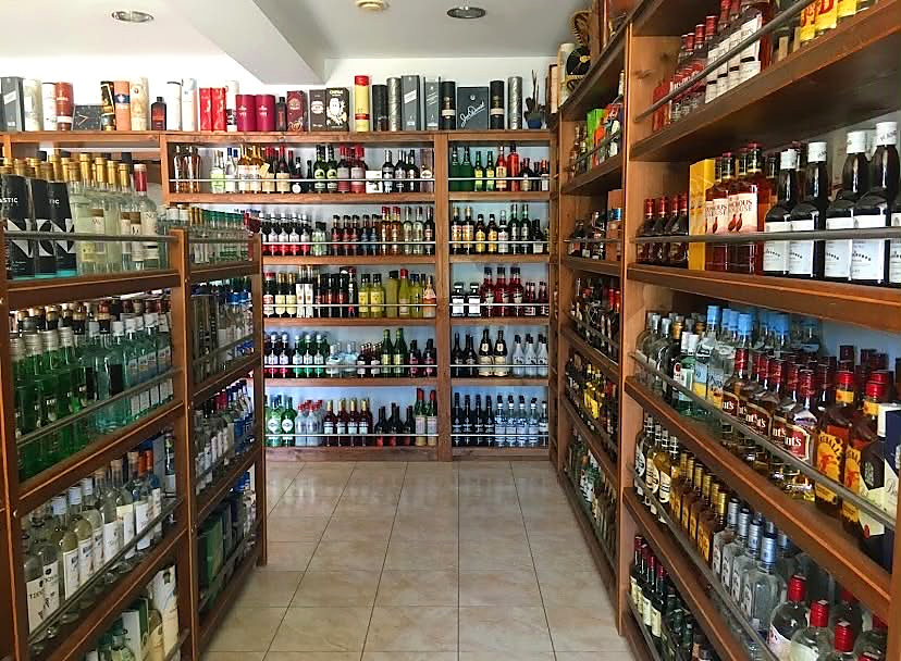 Wide view down the aisle at Anagnostatos Liquor Store
