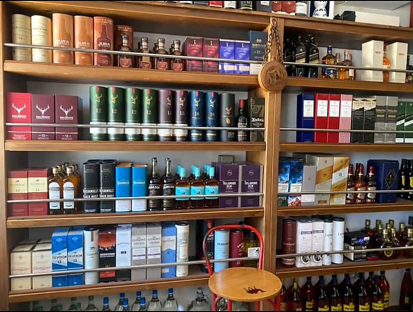 Whisky wall with single malts and blended Scotch